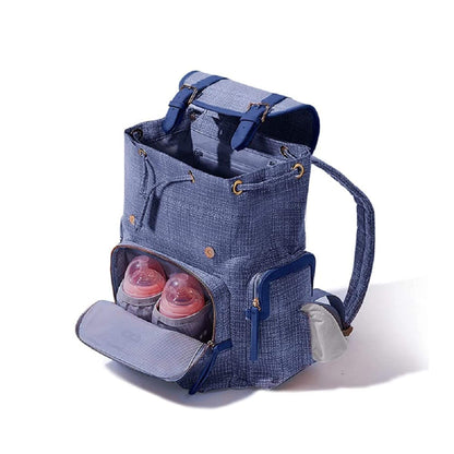 Sunveno Tweed Diaper Backpack Blue with baby bottles inside on a white background