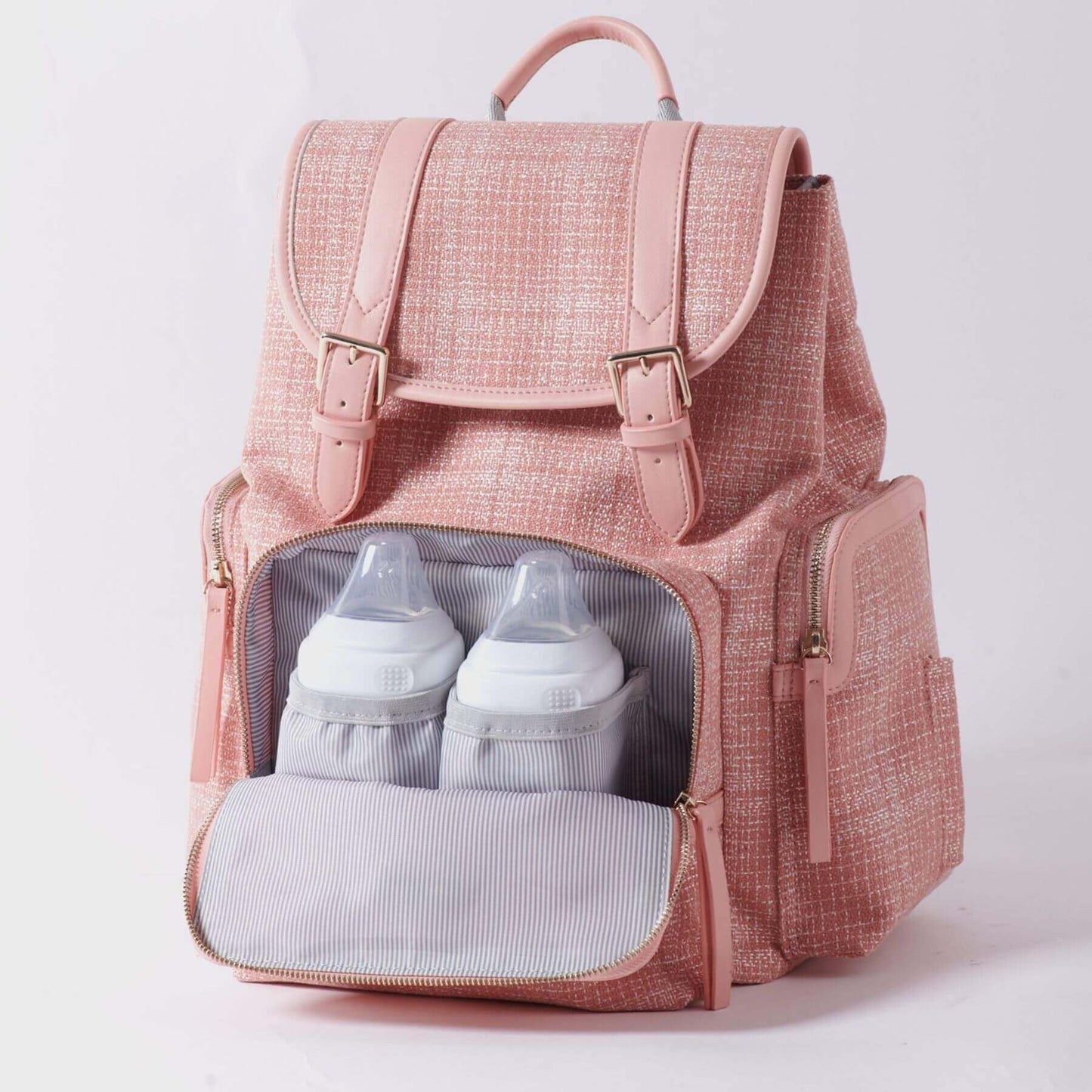 Sunveno Tweed Diaper Backpack Pink with bottles inside on a light gray background