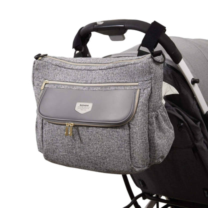 Tweed Luxe Stroller Organizer Grey attached to a stroller