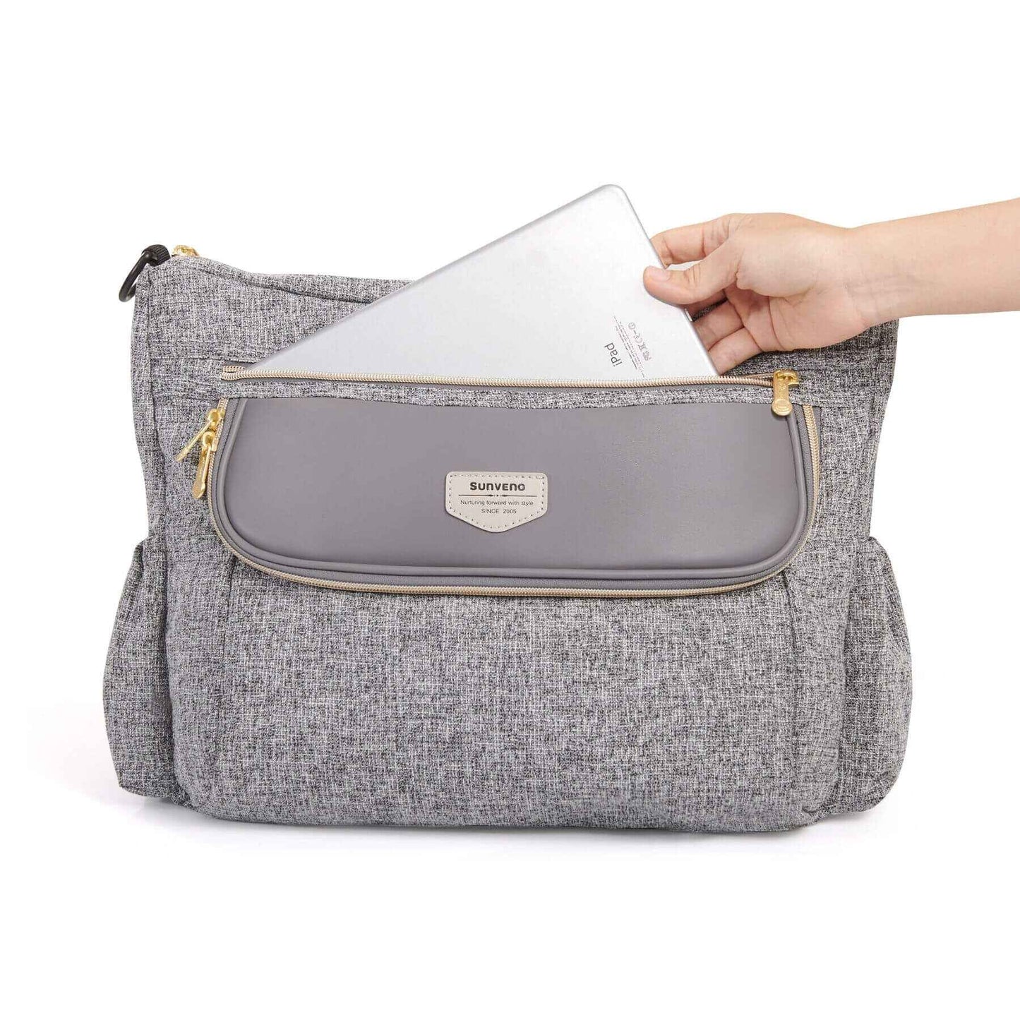 Tweed Luxe Stroller Organizer with a hand holding a white card, on a white background