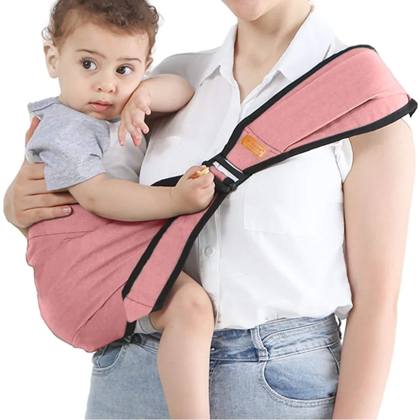 Woman holding a baby in RocketBaby USA Universal Baby Carrier Pink