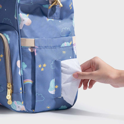 Hand reaching tissue in Sunveno Timeless Baby Diaper Backpack - Blue Unicorn
