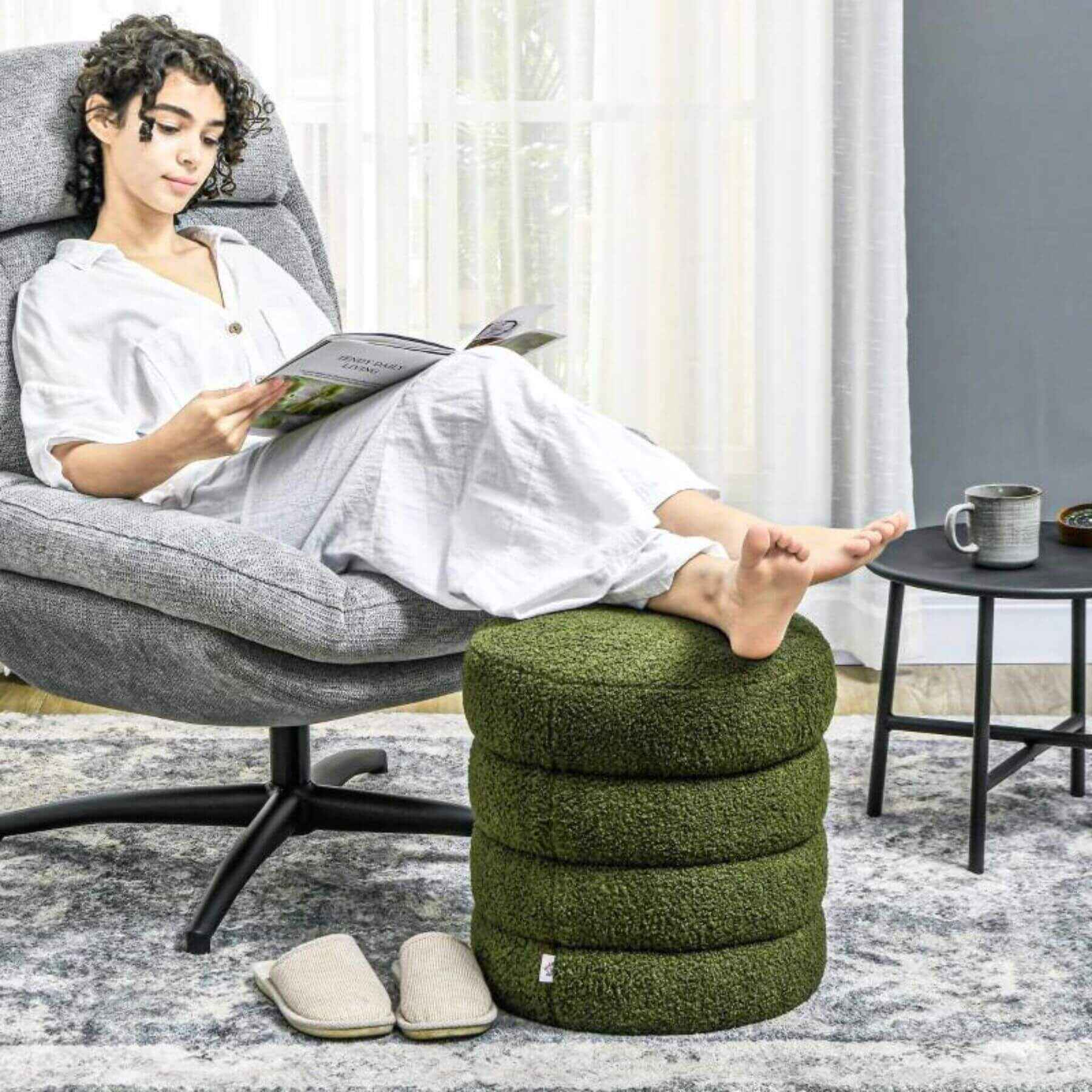 Girl Resting Legs on HOMCOM Round Ottoman, Upholstered Foot Stool with Steel Frame, Green