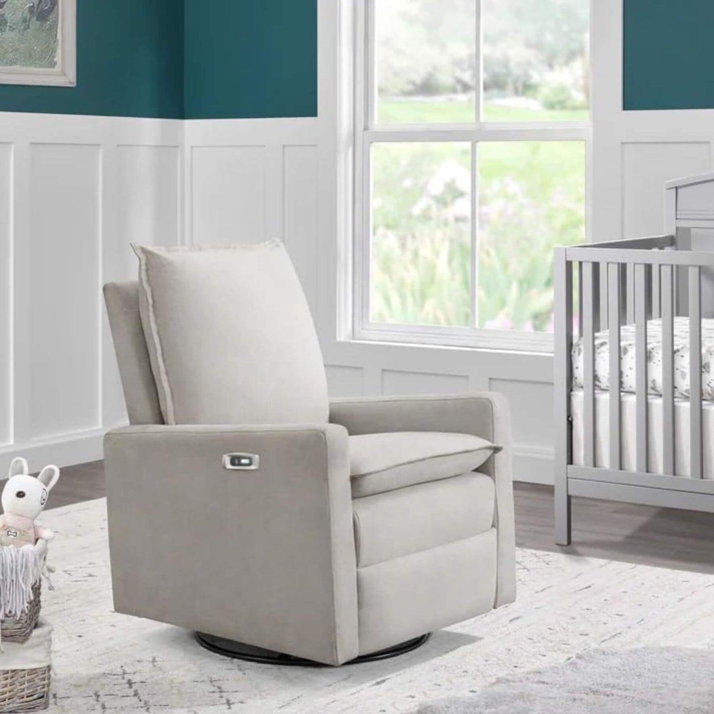 Uptown Power Recliner - Sand in a nursery with a crib and window in the background.