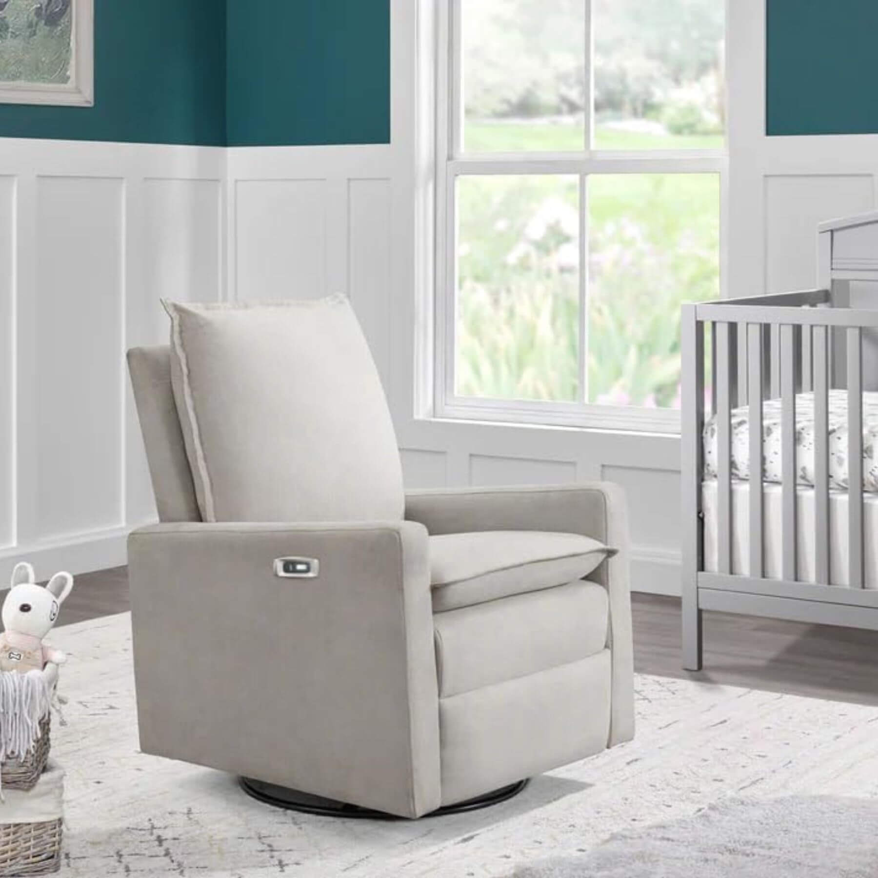 Uptown Power Recliner - Sand in a nursery with a crib and window in the background.