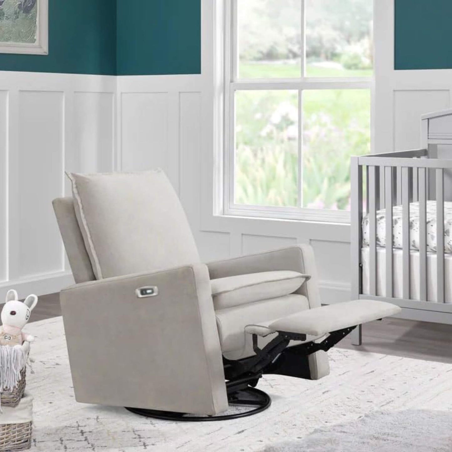 Uptown Power Recliner - Sand in a nursery with a crib and window in the background.