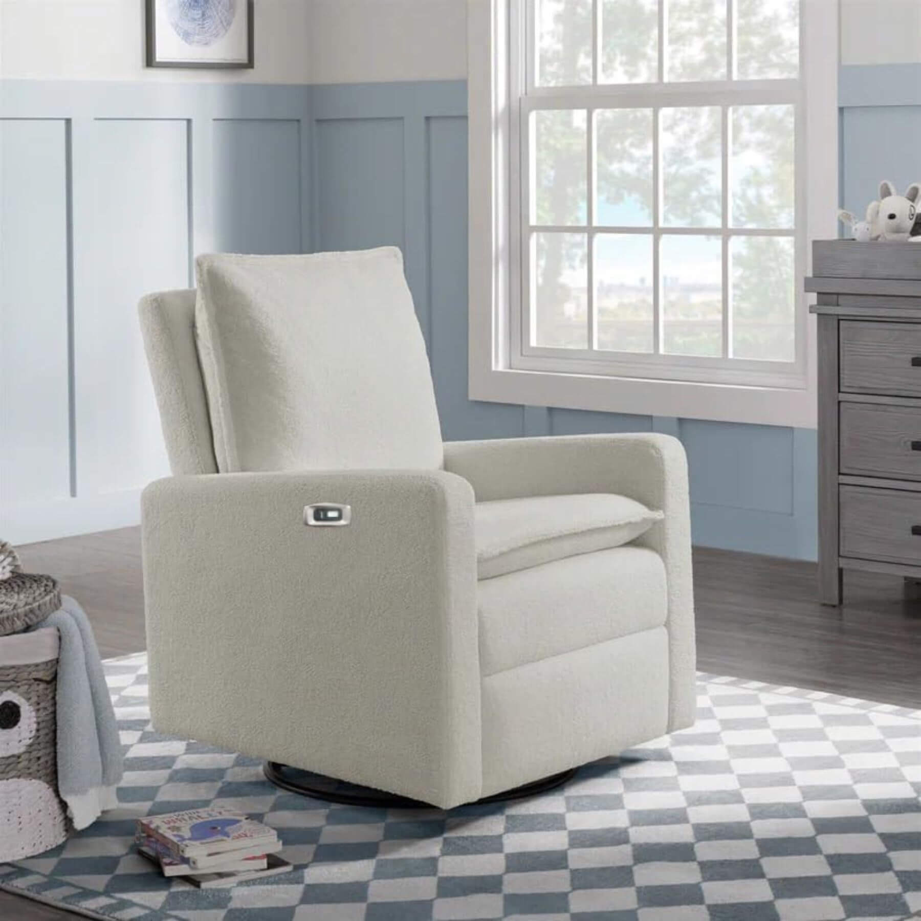 Uptown Power Recliner in a nursery with a checkered rug and window in the background.