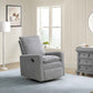 Uptown Nursery Swivel Rocker and Recliner in Corduroy Ash Gray in a living room setting with a lamp, window, and dresser.