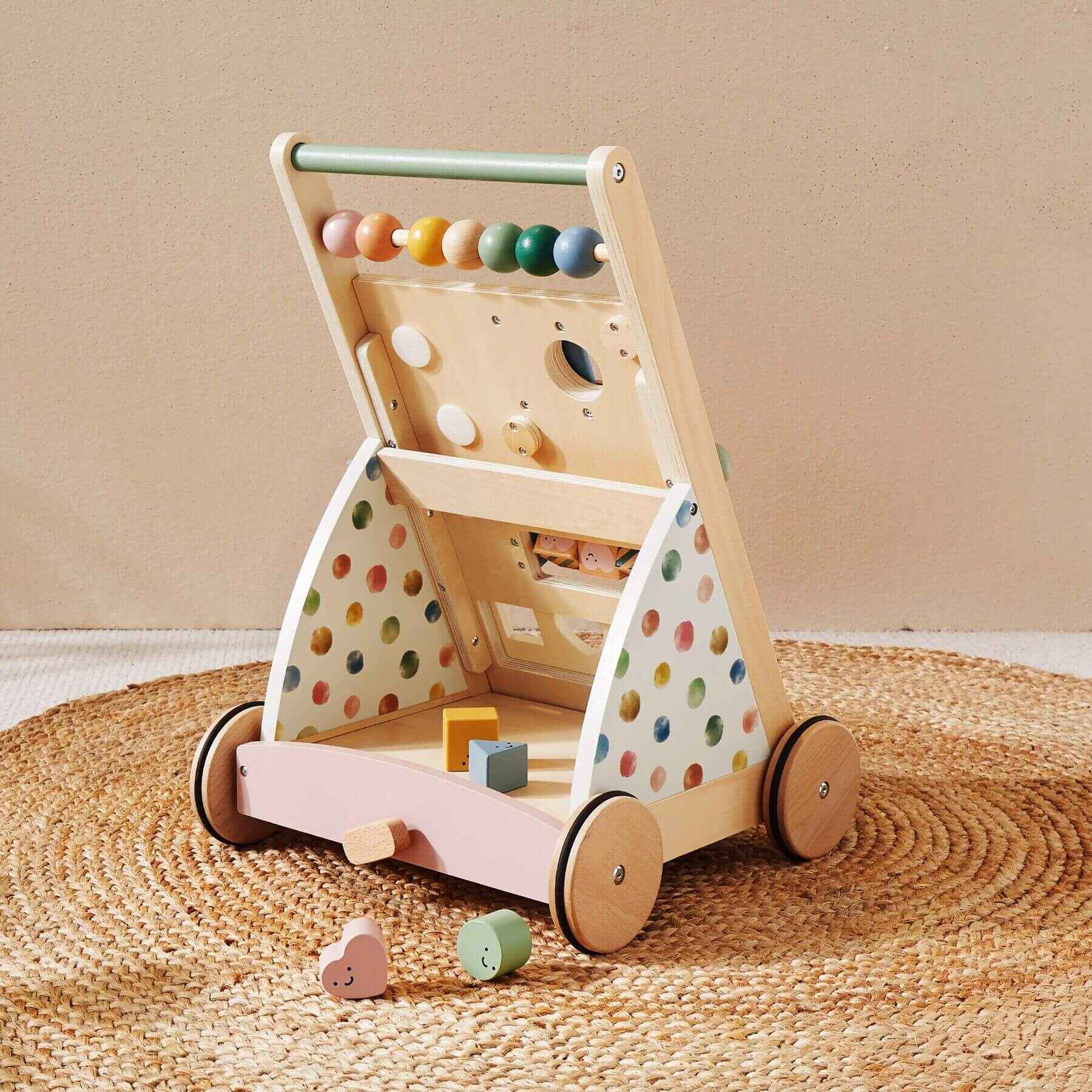 Tiny Land® Versatile Natural Wooden Baby Walker on a beige background