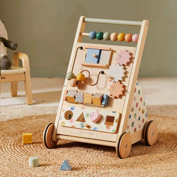 Tiny Land® Versatile Natural Wooden Baby Walker on a textured rug