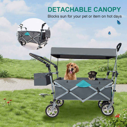 Gray pet stroller with detachable canopy in a grassy outdoor setting