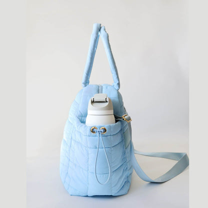 Side View of augustnoa the weekender duffle bag blue