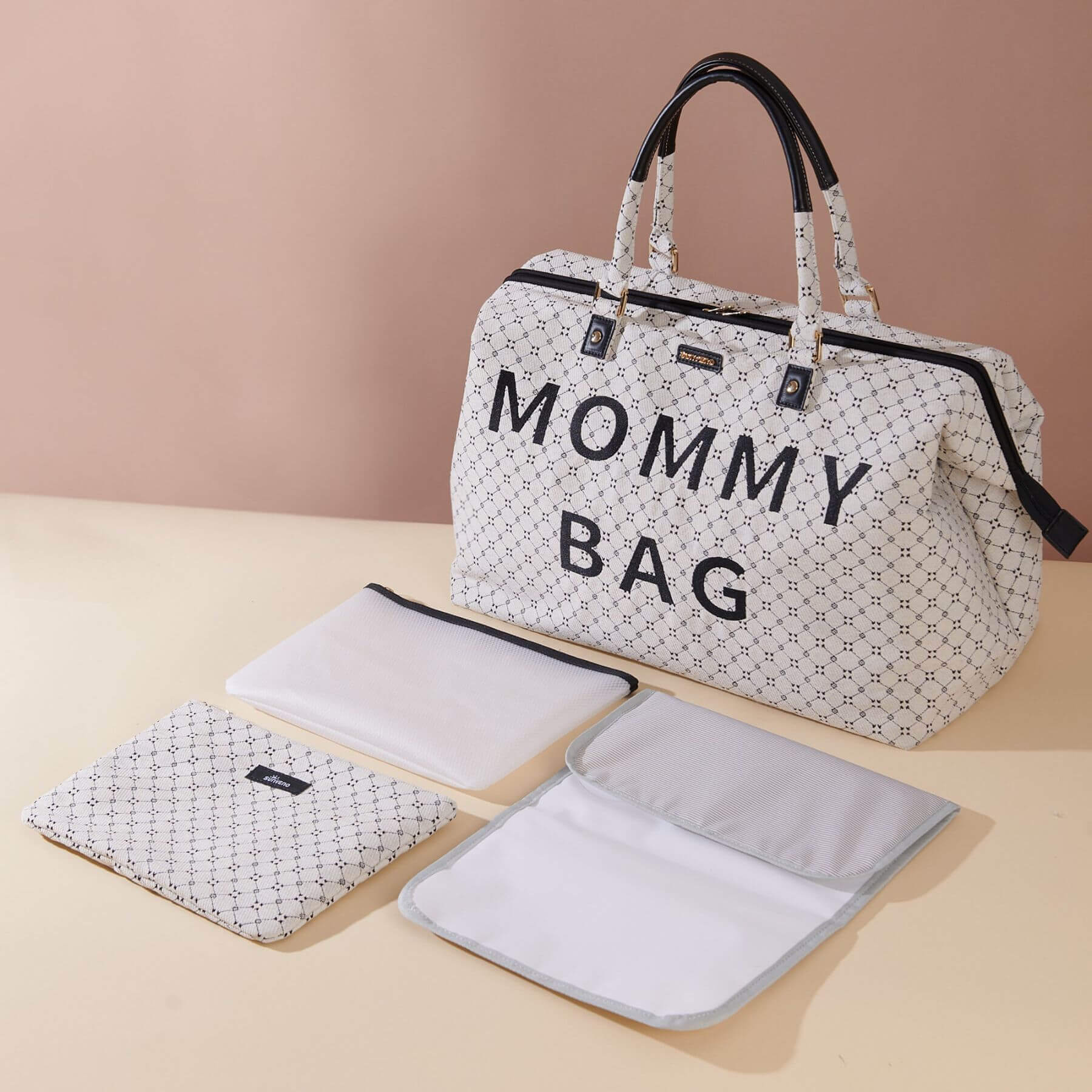 Sunveno Weekender Mommy Bag Travel Duffle - White and matching pouches on a beige background