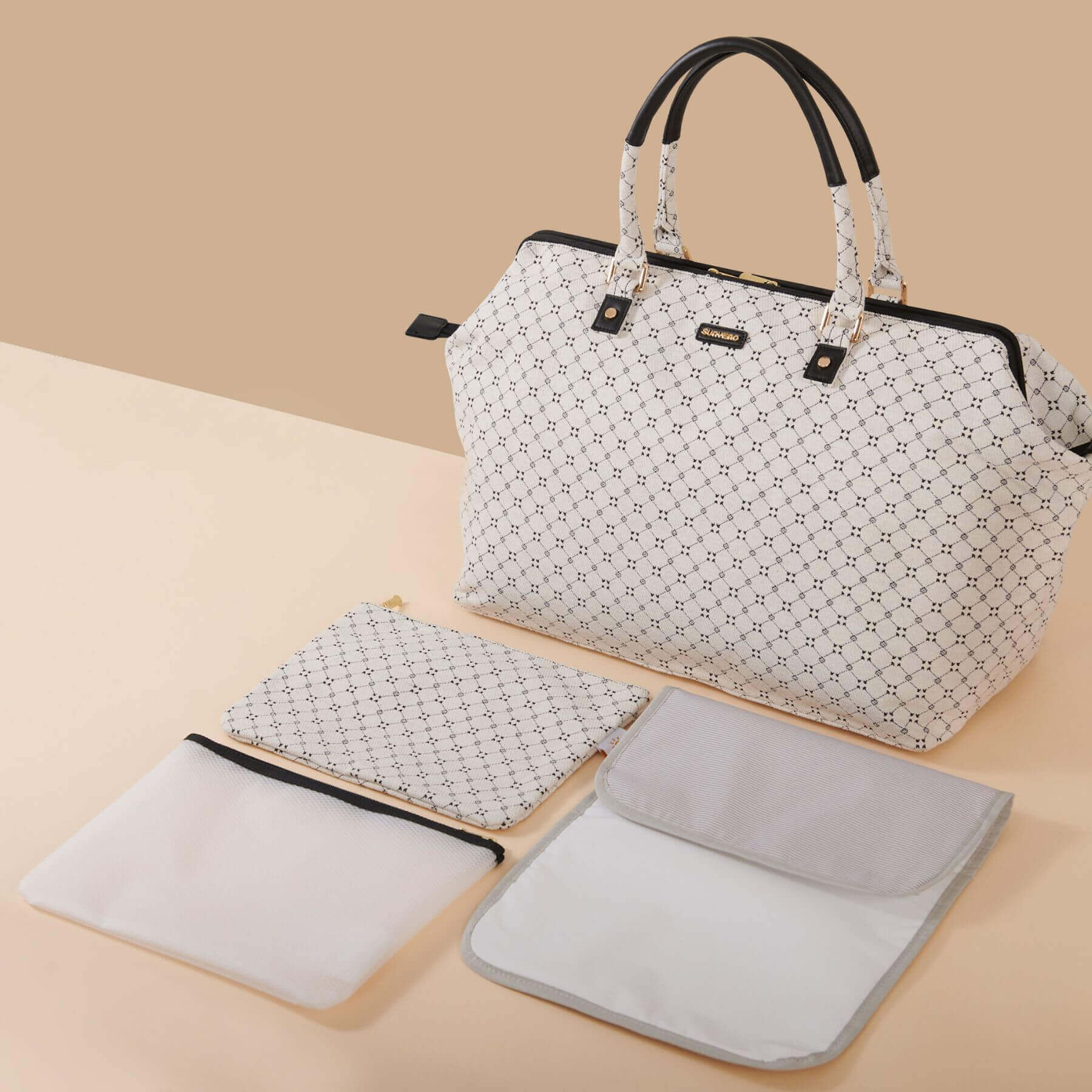 Sunveno Weekender Mommy Bag Travel Duffle - White Classic with matching pouches on a beige background