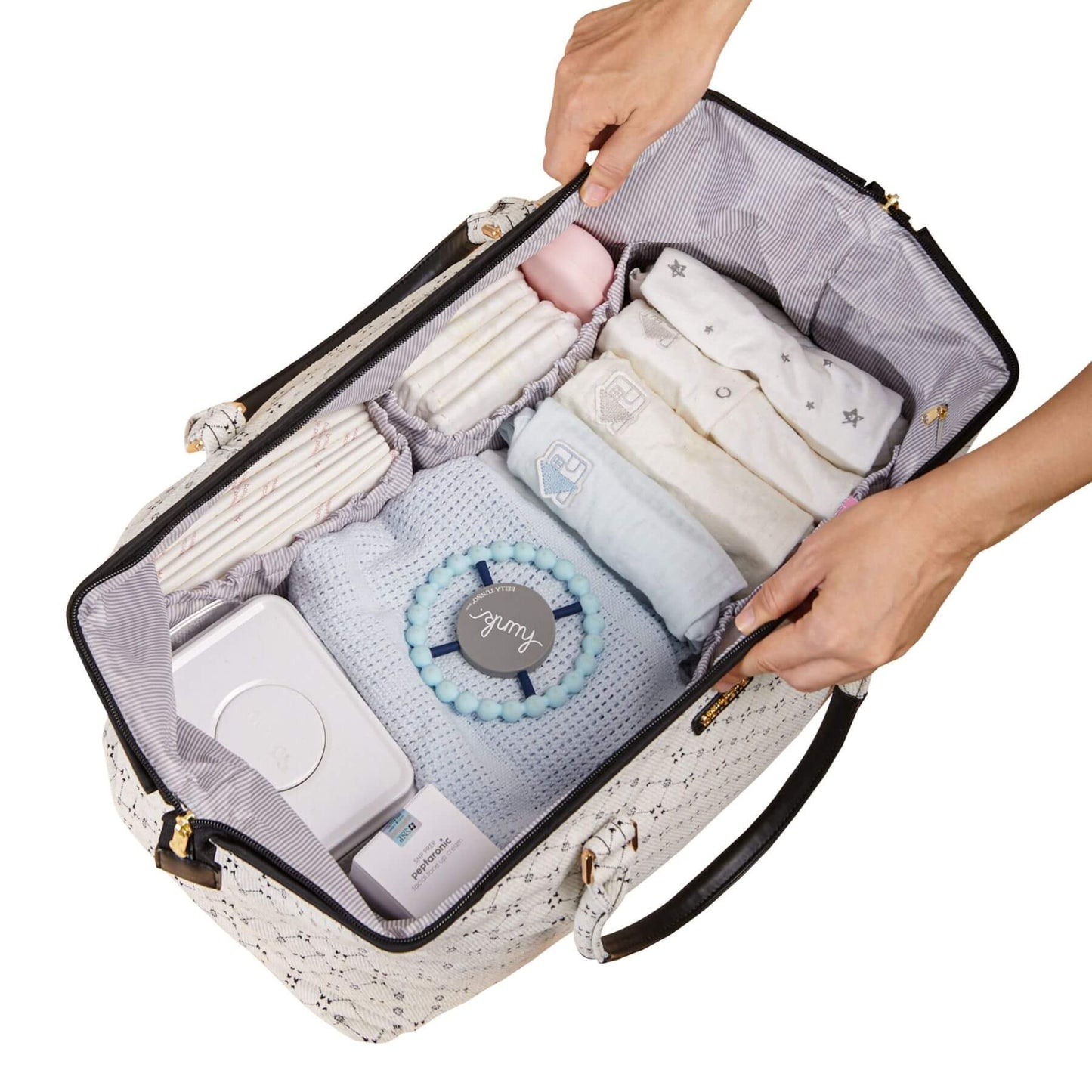 Open Sunveno Weekender Mommy Bag Travel Duffle - White Classic with baby items including diapers, wipes, and a toy