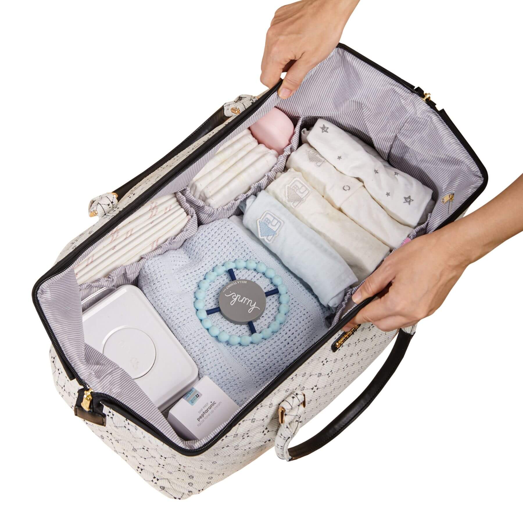 Open Sunveno Weekender Mommy Bag Travel Duffle - White Classic with baby items including diapers, wipes, and a toy
