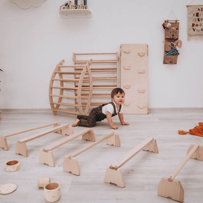 Boy Playing Wood and Hearts Balance Beam Set