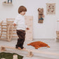 Boy Walking on Wood and Hearts Balance Beam Straight