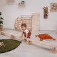 Boy Playing near Wood and Hearts Balance Beam Straight