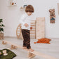 Boy Walking on Wood and Hearts Balance Beam Straight