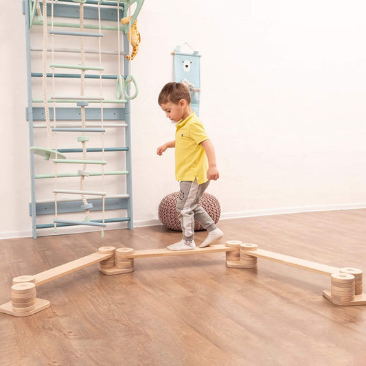 Boy Playing Wood and Hearts Balance Beam Zigzag
