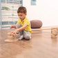 Boy Setting up Wood and Hearts Balance Beam Zigzag