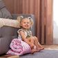 Girl Sitting on Rolled Up Wood and Hearts Climbing Arch Cushion
