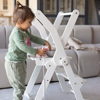 Girl Playing at Wood and Hearts Foldable Kitchen Tower