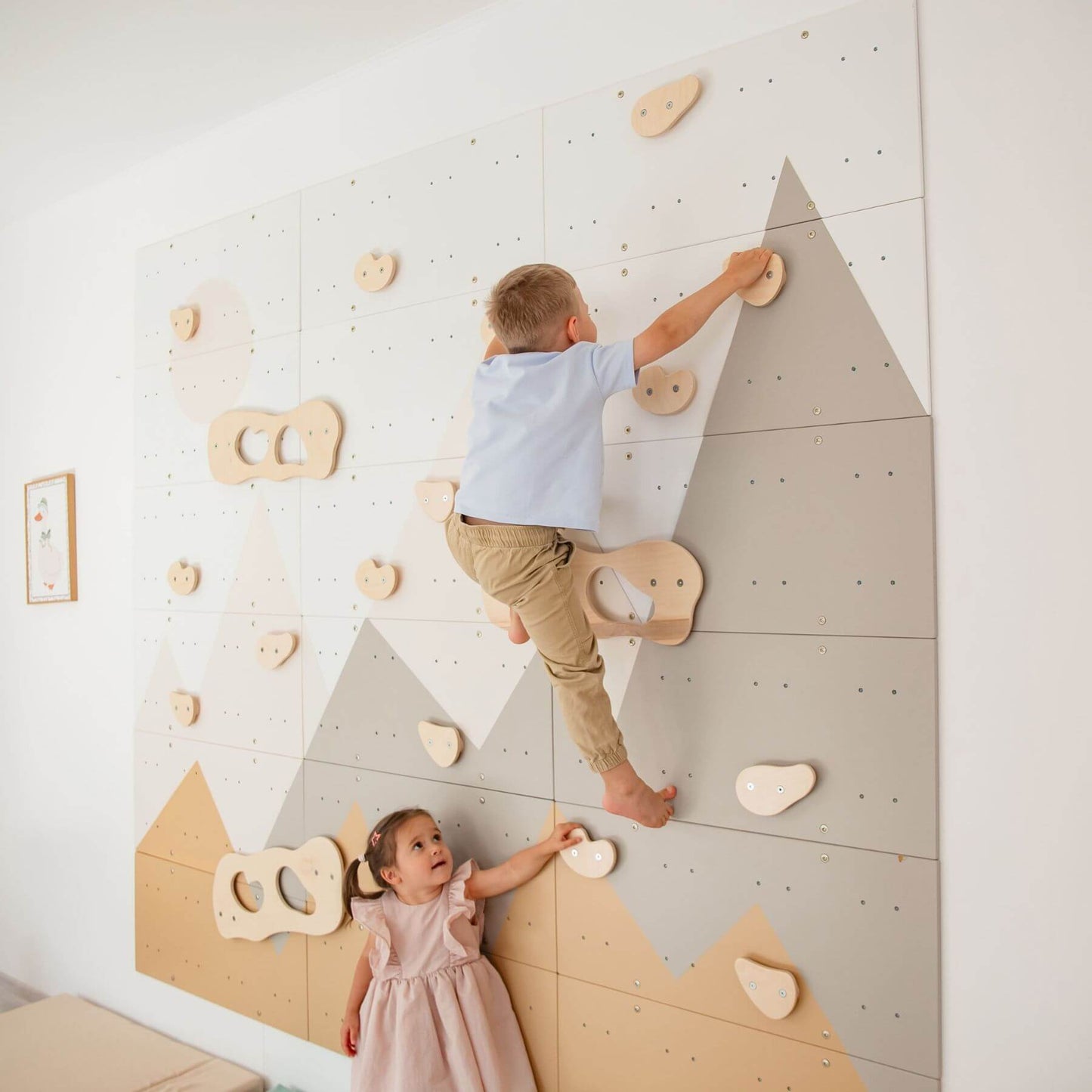 Children playing on Wood and Hearts Indoor Climbing Wall