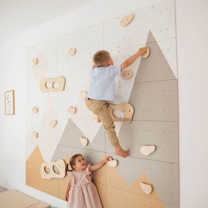 Children playing on Wood and Hearts Indoor Climbing Wall