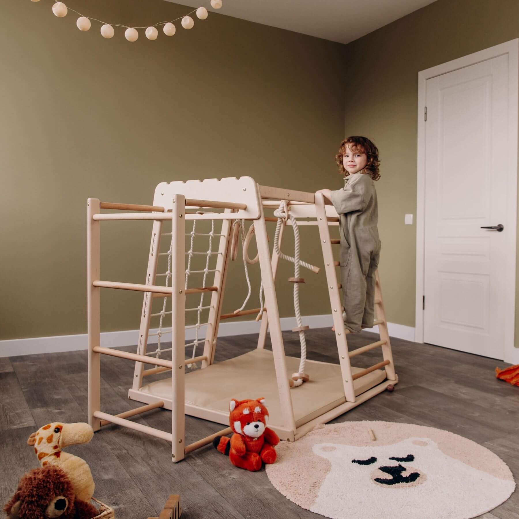 Kid Playing on Wood and Hearts Indoor Jungle Gym - Trapeze + Ladder + Mat + Rope