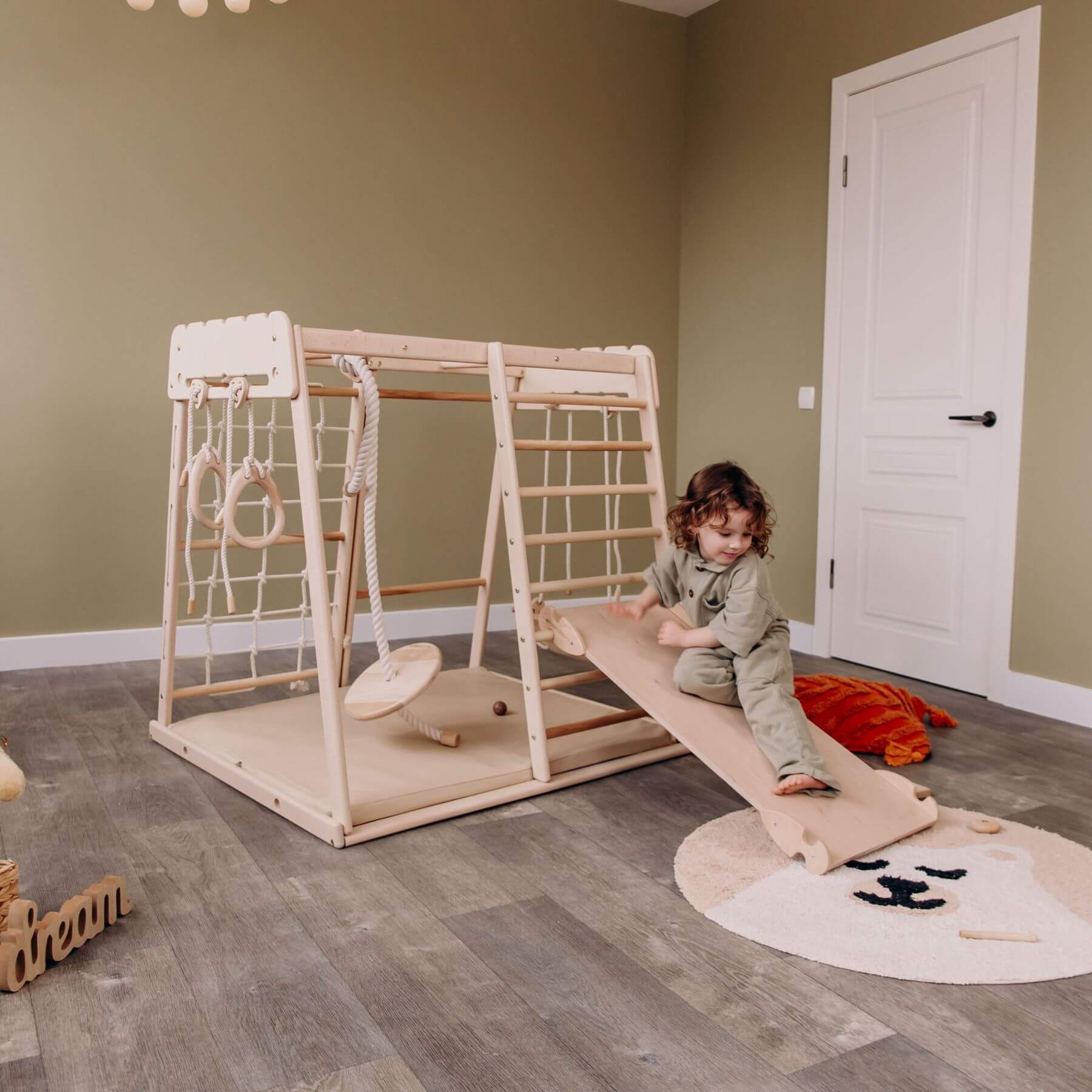 Kid Playing on Wood and Hearts Indoor Jungle Gym - Trapeze + Mat + Ramp + 4 Rope