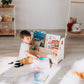 Boy Getting Books from Wood and Hearts Kids Bookshelf in White & Natural Wood