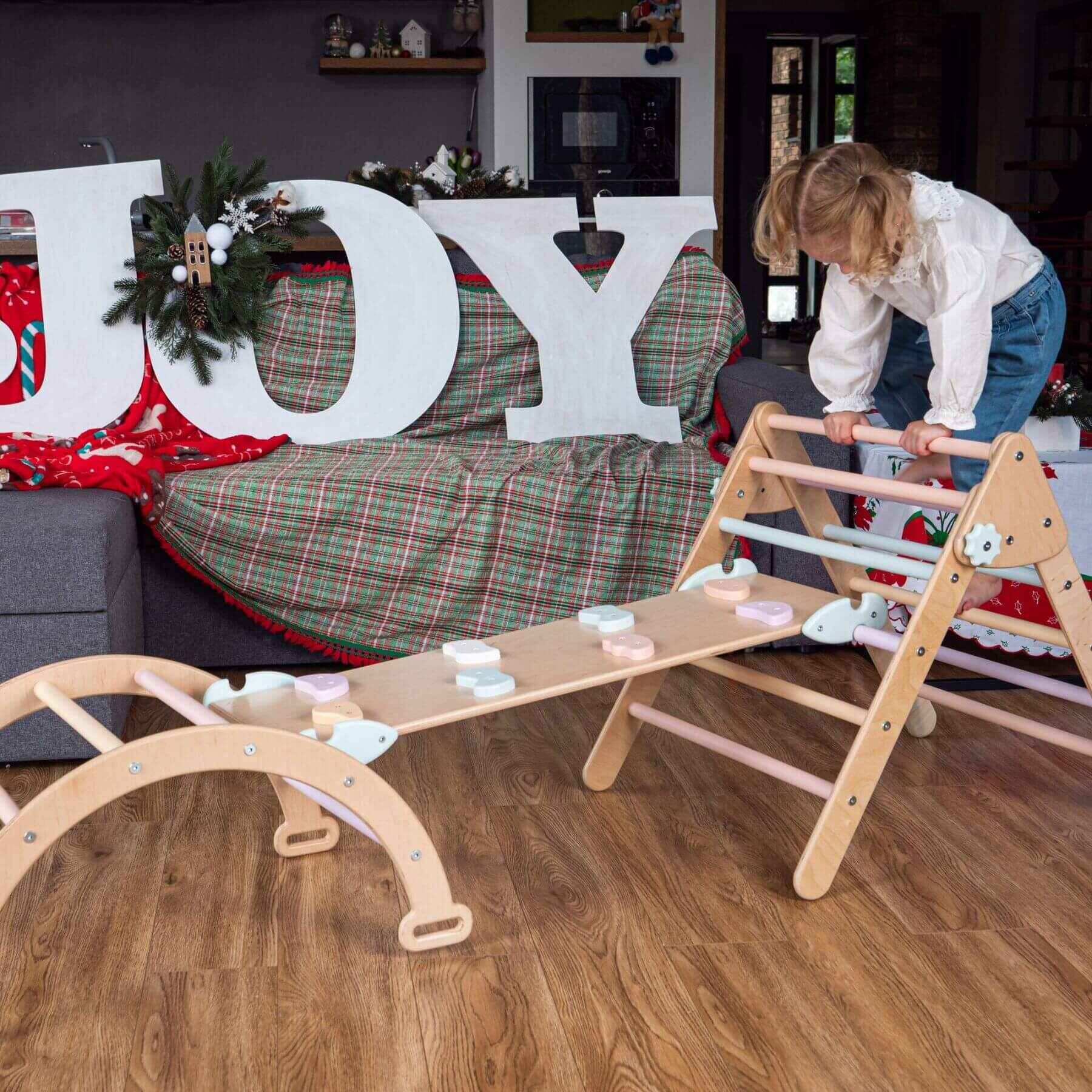 Girl Playing on Wood and Hearts Montessori Climbing Set of 3