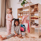 Kids Playing next to Wood and Hearts Montessori Closet Champion Plus