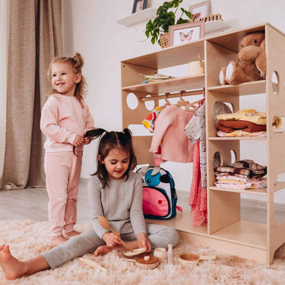 Kids Playing next to Wood and Hearts Montessori Closet Champion Plus