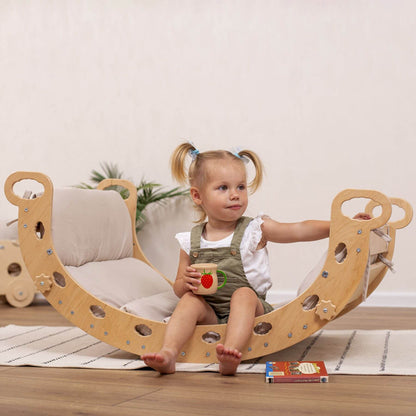 Girl Sitting on Wood and Hearts Montessori Rocker & Pillow Sandy Bay