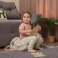 Girl Sitting on Wood and Hearts Montessori Rocker Pillow Folded