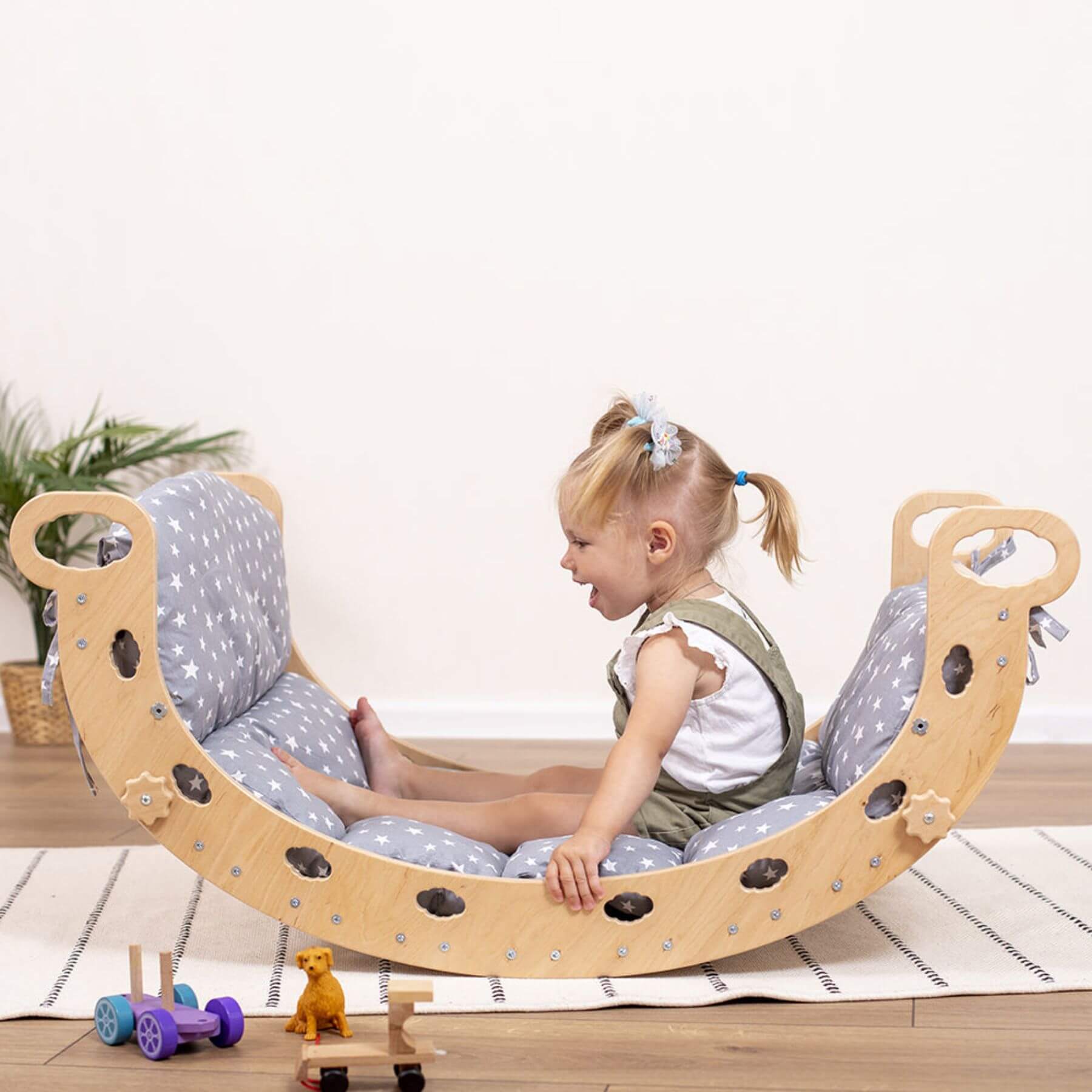 Girl Sitting on Wood and Hearts Montessori Rocker & Pillow Starry Night