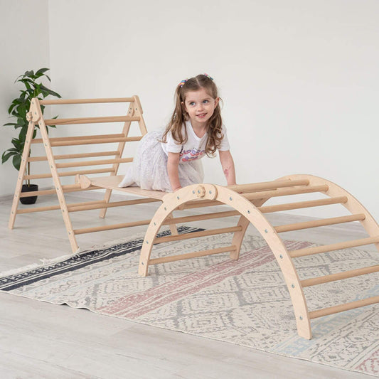 Girl Playing on Wood and Hearts Triangle Climber Set Natural