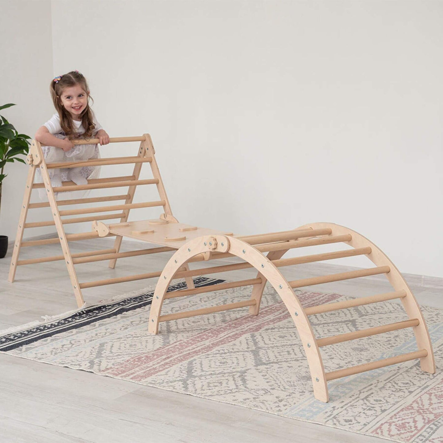 Girl Climbing on Wood and Hearts Triangle Climber Set Natural