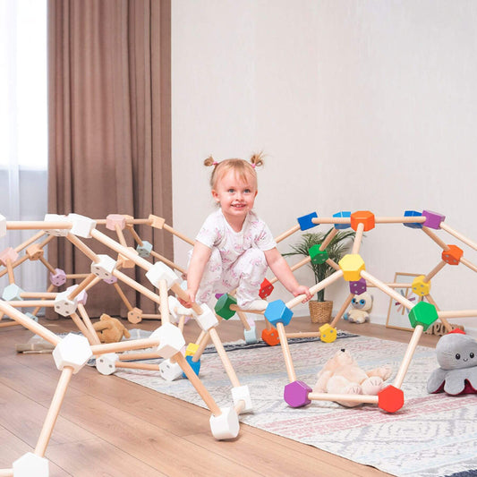 Girl Playing Wood and Hearts Wooden Climbing Domes
