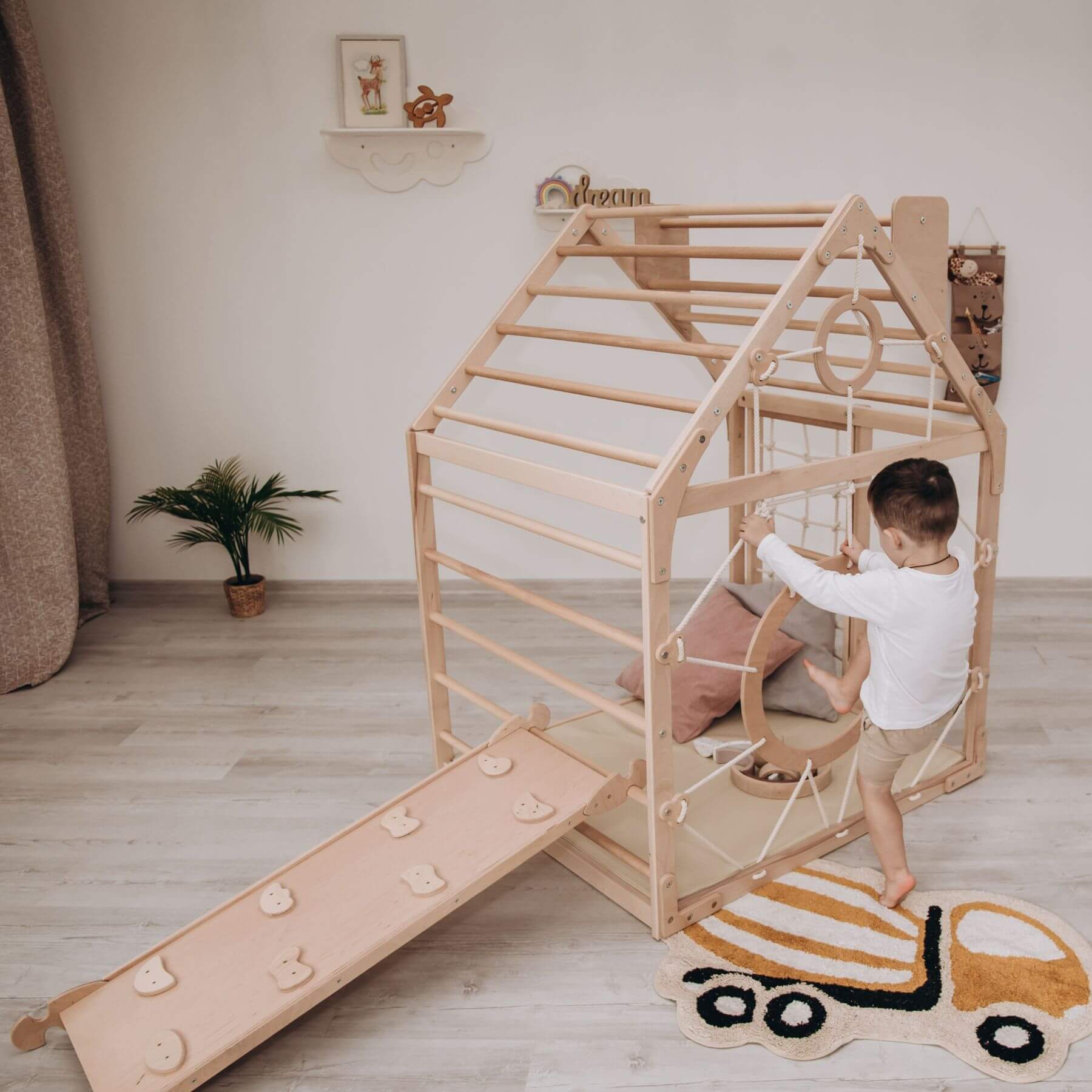 Boy Climbing on Wood and Hearts Wooden Climbing Playhouse w/ Ramp Natural