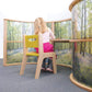 Girl Sitting at Whitney Brothers Nature View Serenity Pod