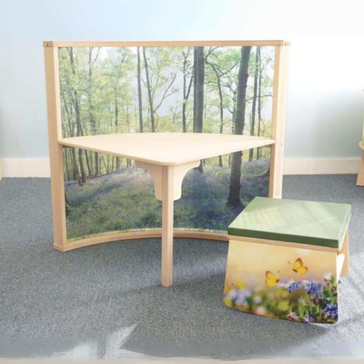 Whitney Brothers Nature View Pod Rocker 12" Tall Next to a Reading Table