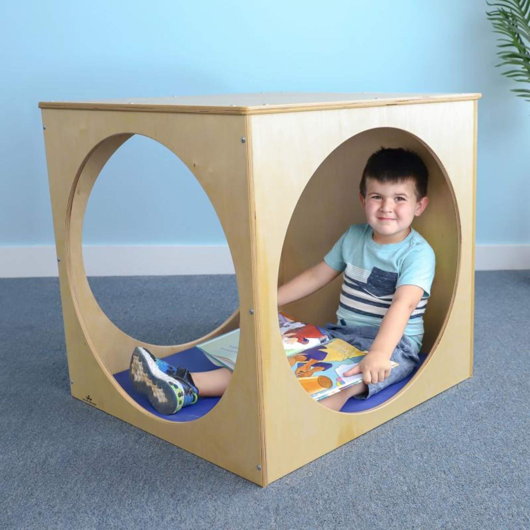 Boy Reading in Whitney Brothers Play House Cube With Floor Mat Set