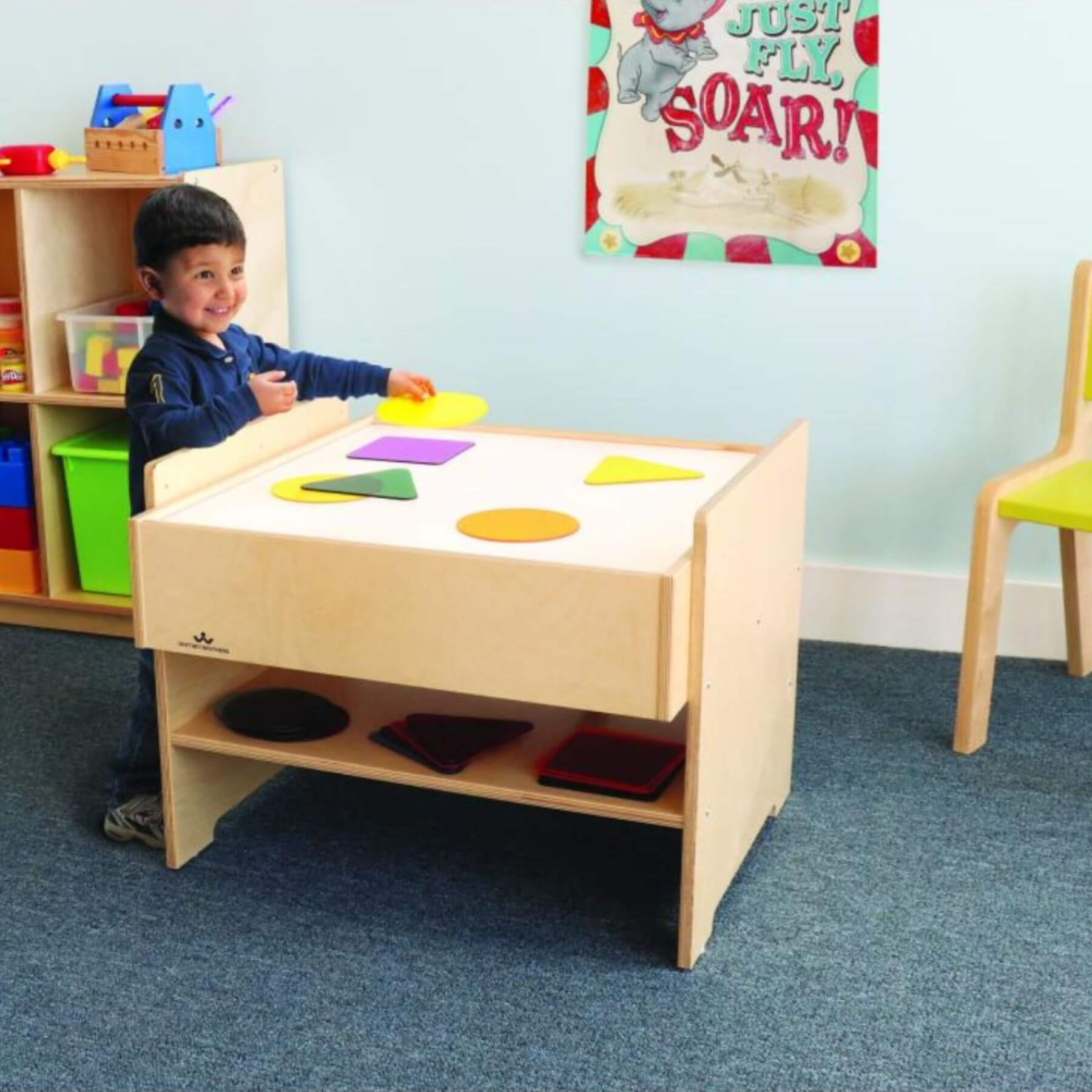 Boy Playing at Whitney Brothers Superbright LED Light Table