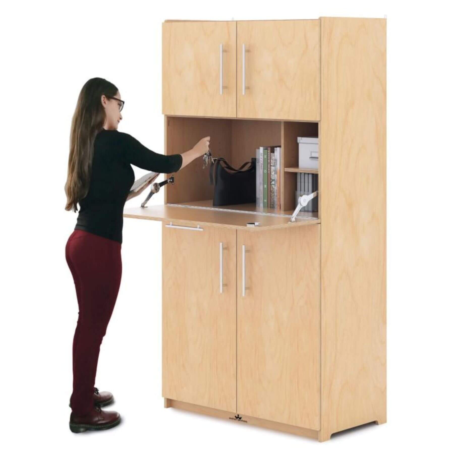 Teacher Using Whitney Brothers Teachers Workstation Cabinet