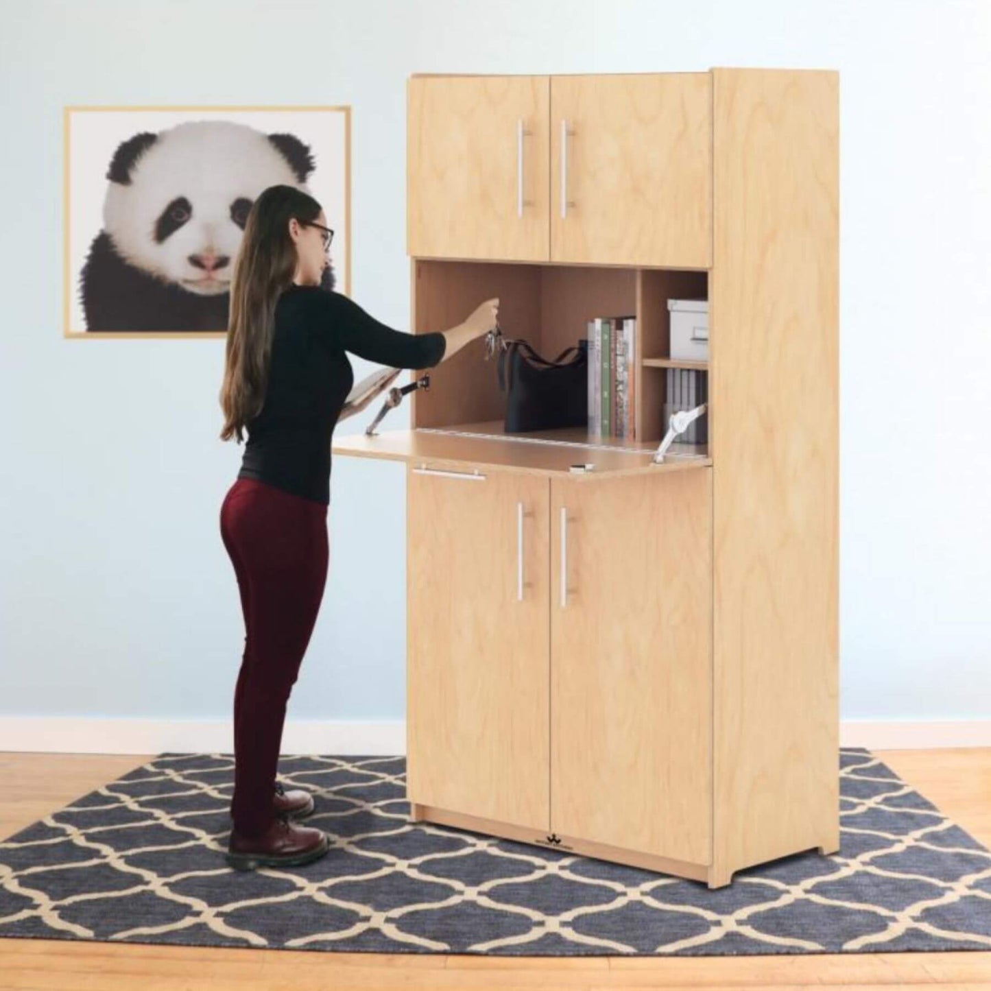 Teacher Using Whitney Brothers Teachers Workstation Cabinet