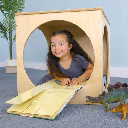 Girl Reading inside of Whitney Brothers Toddler Play House Cube